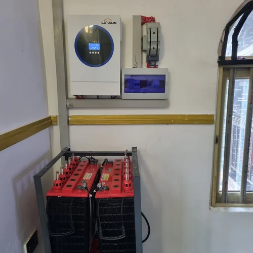 Image showing Robust solar system with batteries, inverter, and tidy wiring.